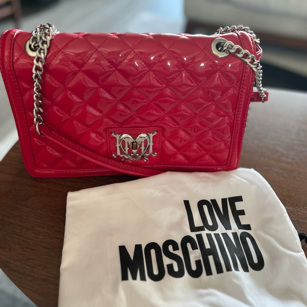 red shoulder/sling bag.